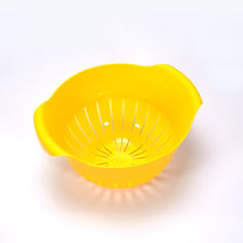 Plastic strainer bowl for easy fruit washing.