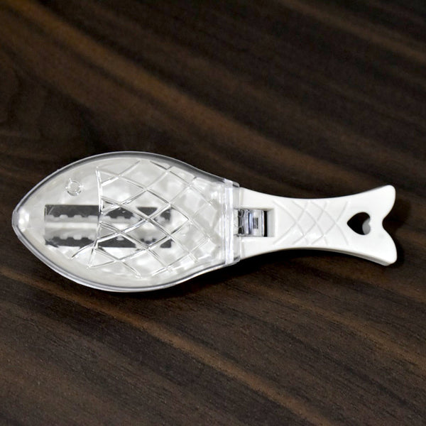 Fish scale scraper tool for easy fish cleaning.